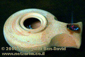 1st-century oil lamp, flickering